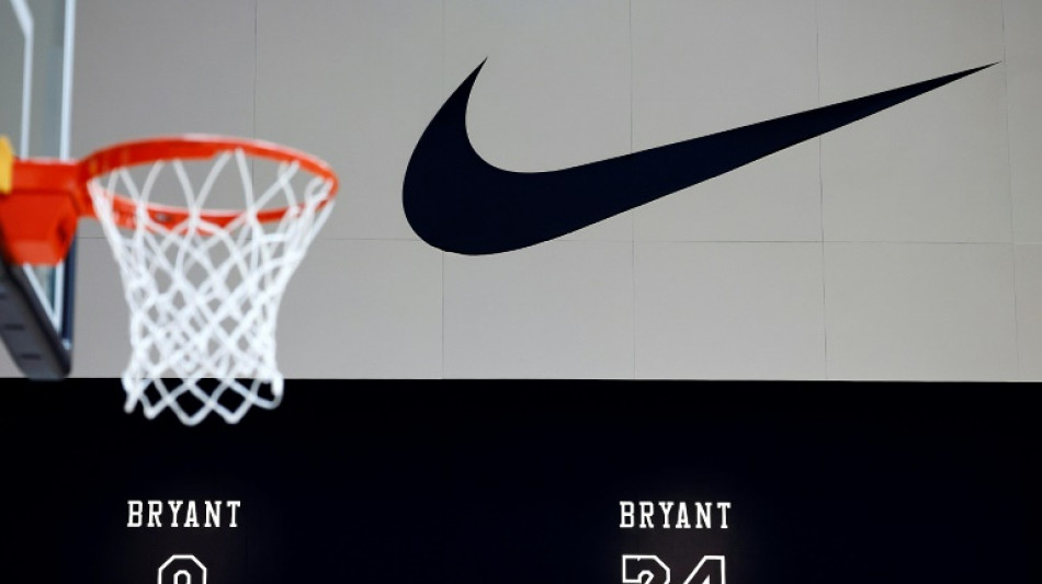 Nike earnings drop, says turnaround will take time