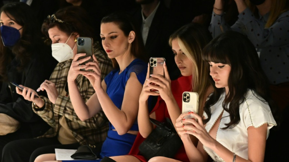 Sidewalk is new catwalk outside Milan fashion shows 