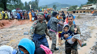 India landslide toll hits 126 as rain hampers rescue work