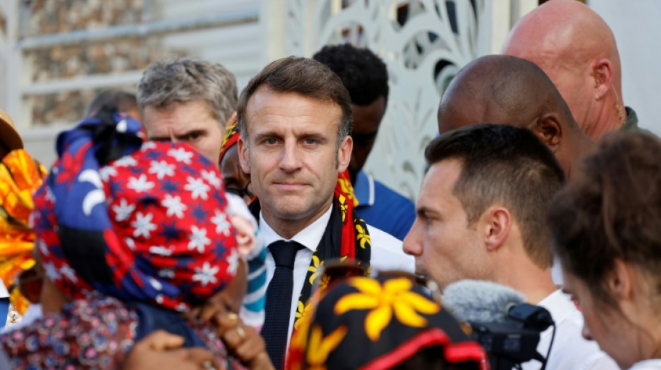 Macron extends visit cyclone-hit Mayotte after locals vent anger