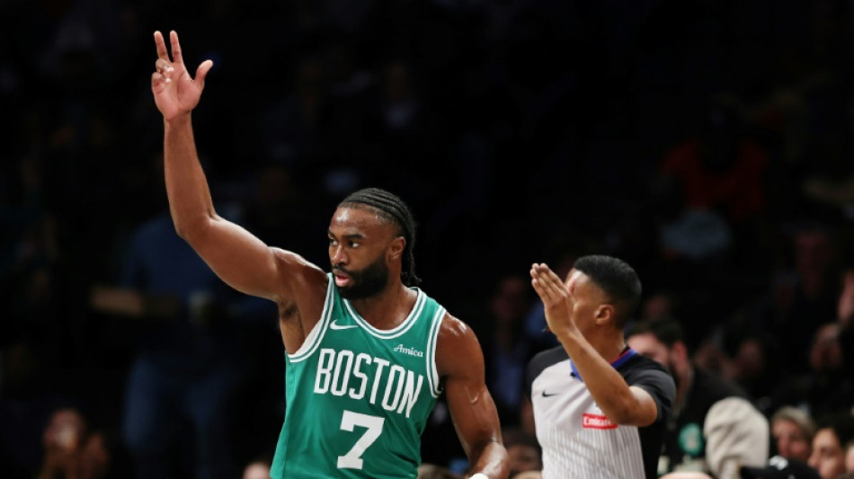 Celtics labor to win over Wizards, Warriors into Cup quarters