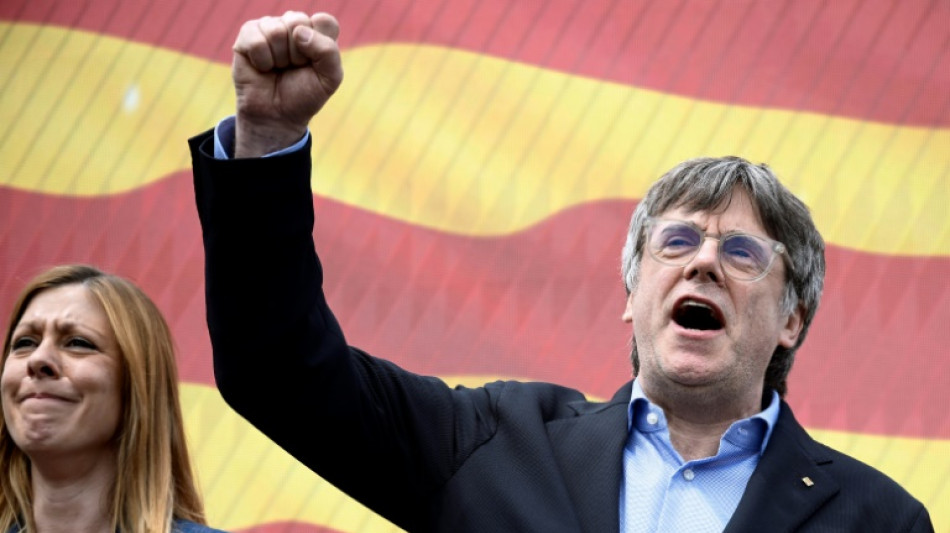 Fugitive Catalan ex-leader Puigdemont returns to Spain and vanishes again