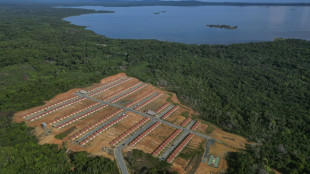 Primeros desplazados del cambio climático en Panamá emprenden el adiós de su isla