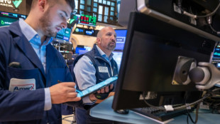 Après un bon début, Wall Street retombe dans le rouge