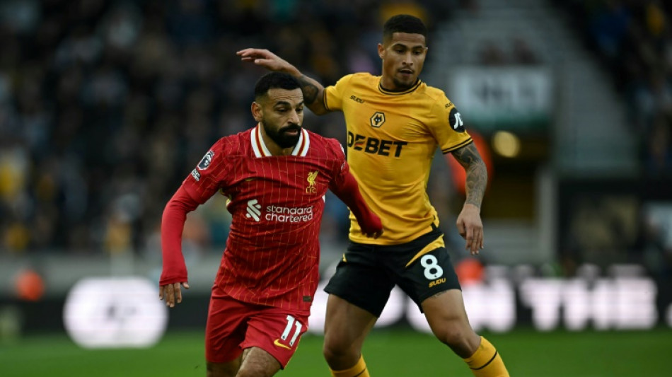 Salah sinks Wolves as Liverpool go top