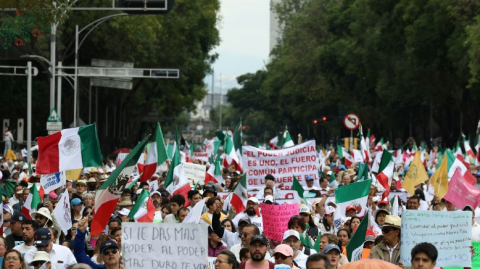 Mexico president defends reforms after top judge's warning