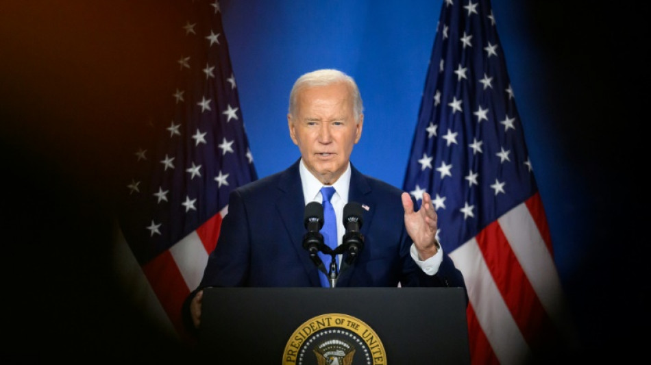 Biden hits campaign trail as calls to quit pile up
