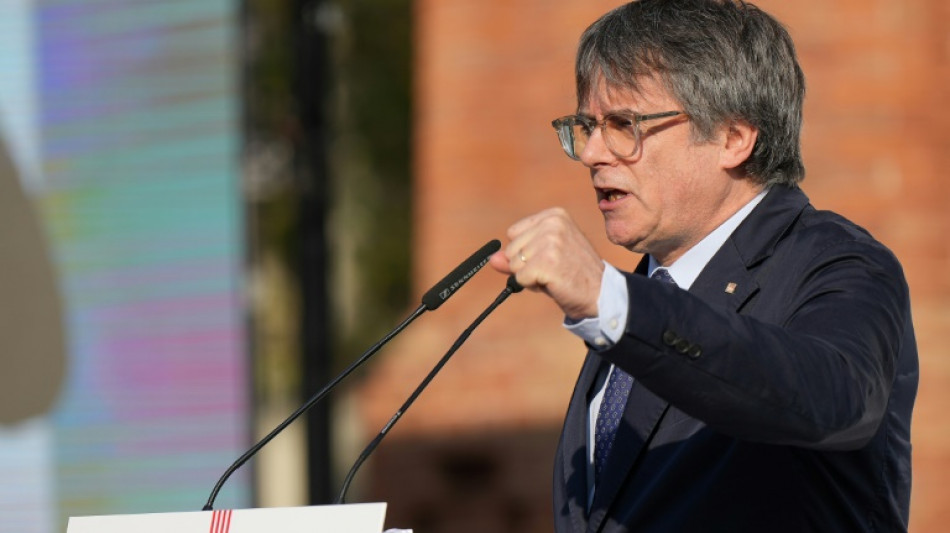 Spain seeks answers after Puigdemont evades arrest