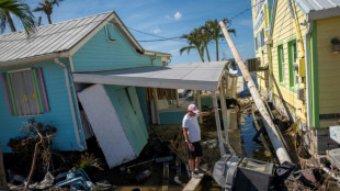 Biden heads into Florida hurricane clean-up zone -- and opponent's territory