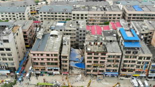 Dozens trapped in China building collapse