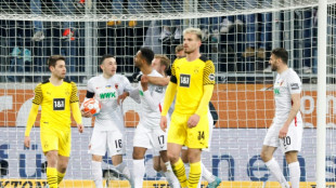 Dortmund held at Augbsurg to leave Bayern eight points clear