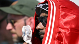 Snoop Dogg wows crowd at sizzling Olympic beach volleyball venue