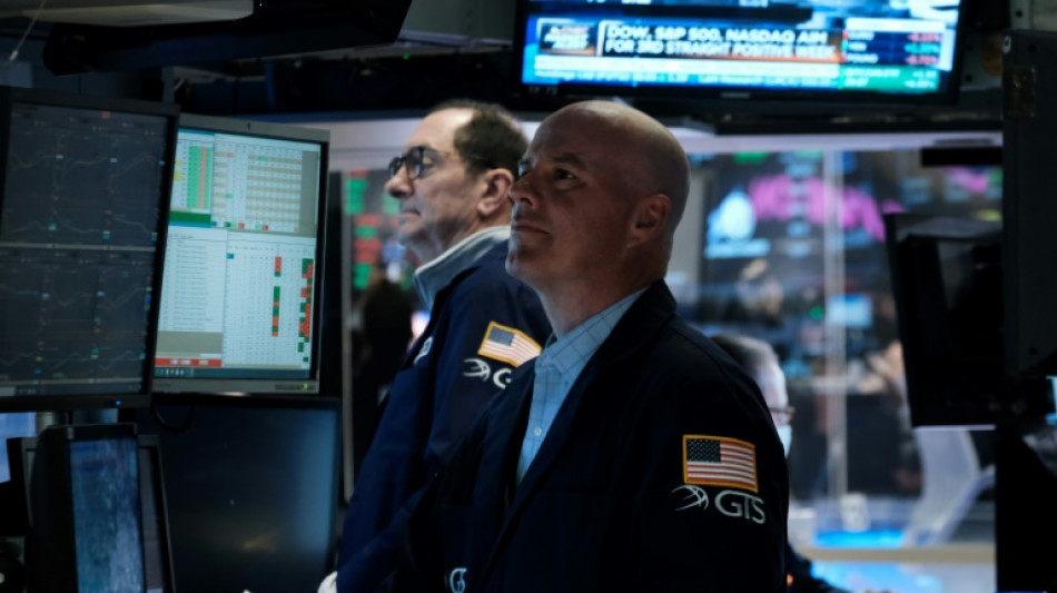 Wall Street conclut en perte, la Fed pèse