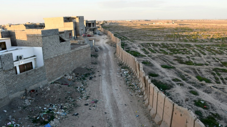 Vestige de la guerre, un mur étrangle encore une ville d'Irak