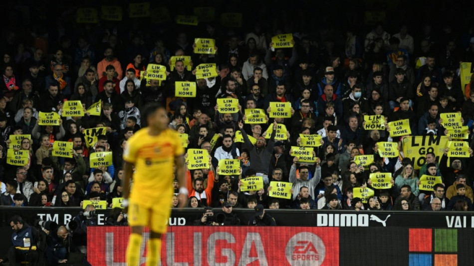 Valencia fans leave Singapore with 'stern warning' after protest