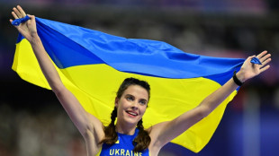 Emotional Mahuchikh dedicates Olympic gold to slain Ukrainian athletes