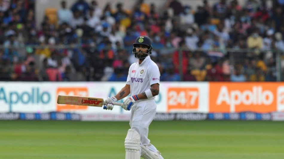 Fan takes on-field selfie with Kohli in security breach at Test